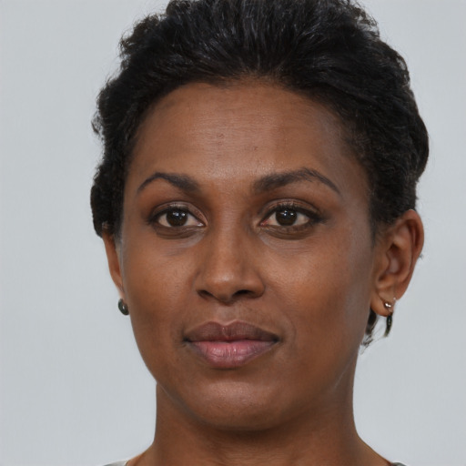Neutral black young-adult female with short  brown hair and brown eyes