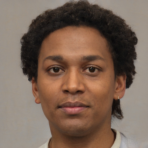 Neutral black young-adult male with short  brown hair and brown eyes