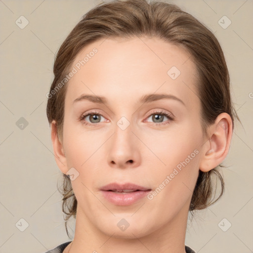 Neutral white young-adult female with medium  brown hair and grey eyes