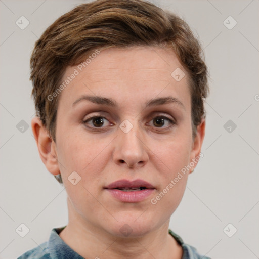 Joyful white young-adult female with short  brown hair and grey eyes