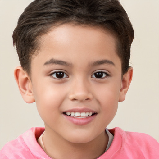 Joyful white child male with short  brown hair and brown eyes