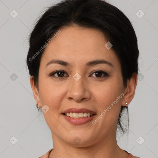 Joyful asian young-adult female with short  brown hair and brown eyes