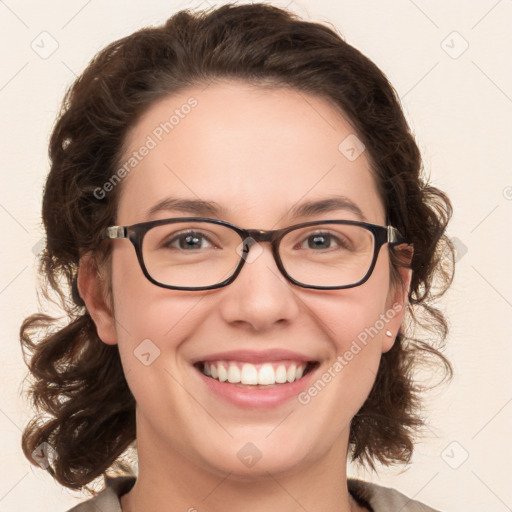 Joyful white young-adult female with medium  brown hair and green eyes