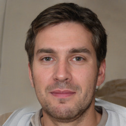 Neutral white adult male with short  brown hair and brown eyes