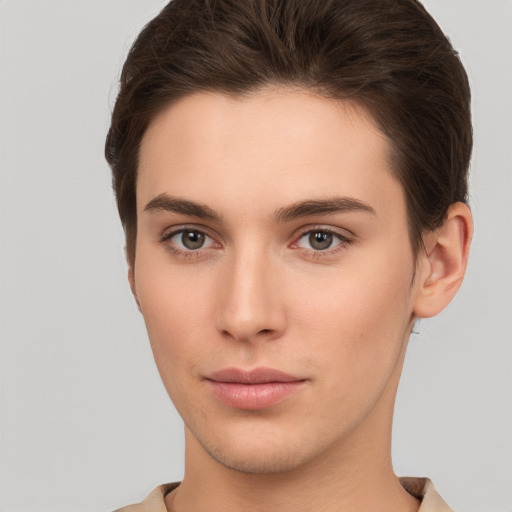 Neutral white young-adult female with short  brown hair and brown eyes