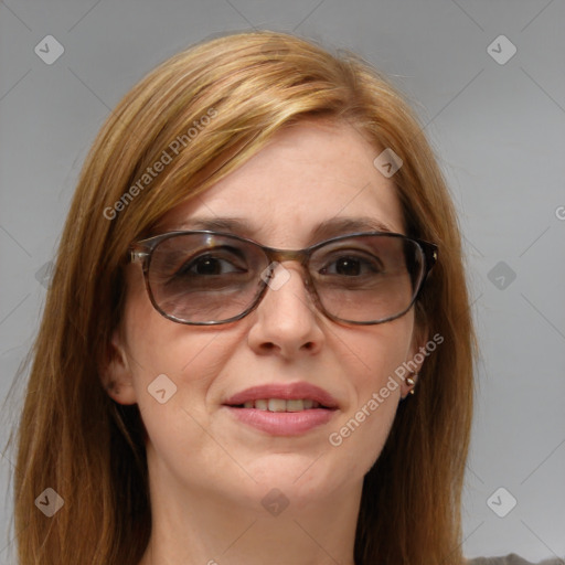 Joyful white adult female with medium  brown hair and blue eyes