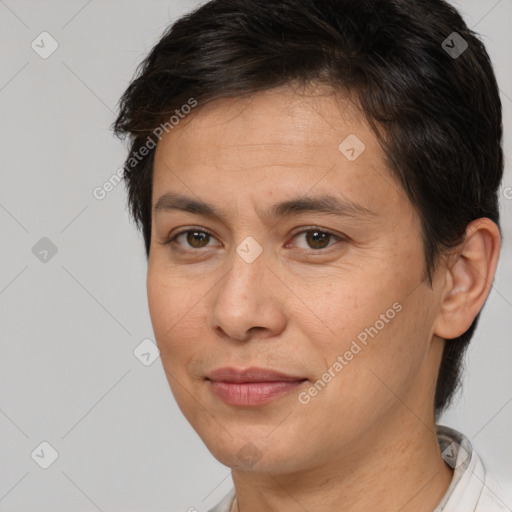 Joyful white adult female with short  brown hair and brown eyes