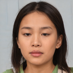 Neutral asian young-adult female with medium  brown hair and brown eyes