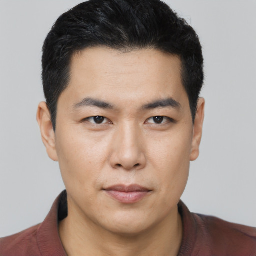 Neutral asian young-adult male with short  black hair and brown eyes