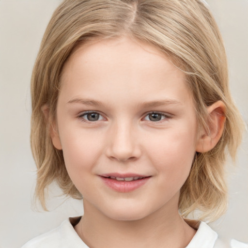 Joyful white child female with medium  brown hair and grey eyes