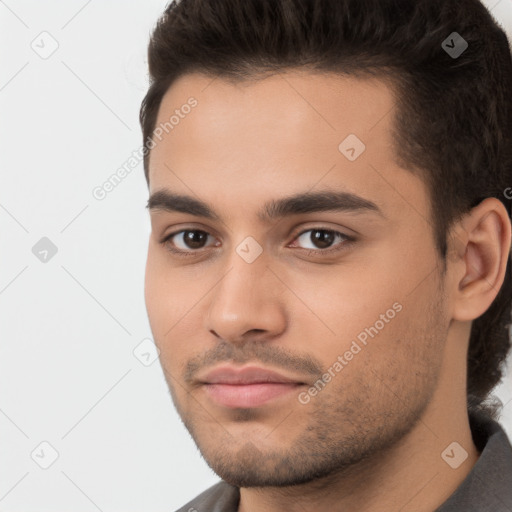 Neutral white young-adult male with short  brown hair and brown eyes