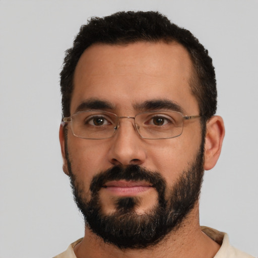Neutral latino adult male with short  black hair and brown eyes