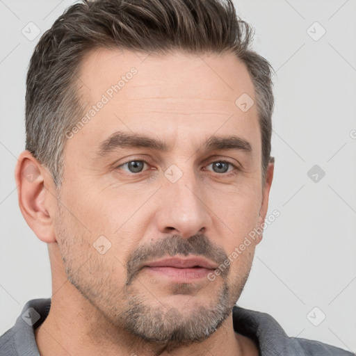 Neutral white adult male with short  brown hair and brown eyes