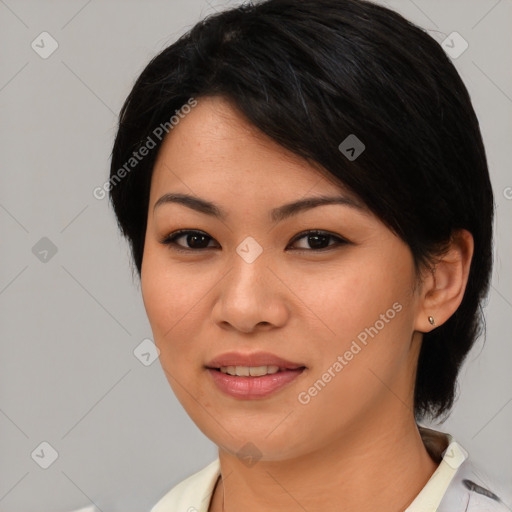 Joyful asian young-adult female with medium  brown hair and brown eyes