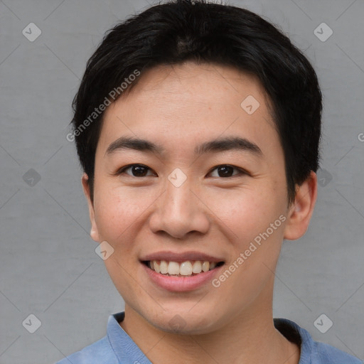 Joyful asian young-adult male with short  brown hair and brown eyes