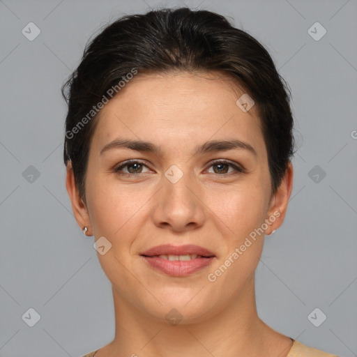 Joyful white young-adult female with short  brown hair and brown eyes