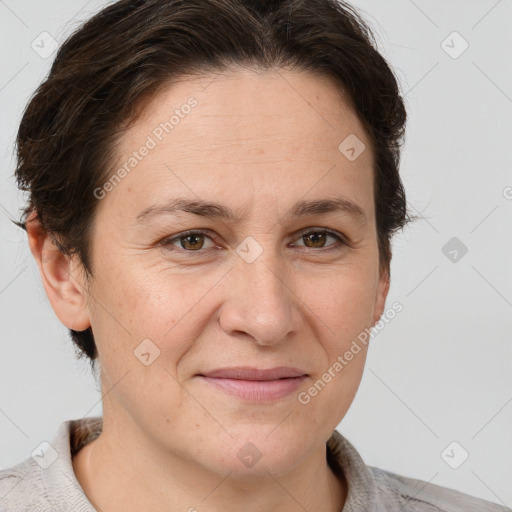 Joyful white adult female with short  brown hair and brown eyes