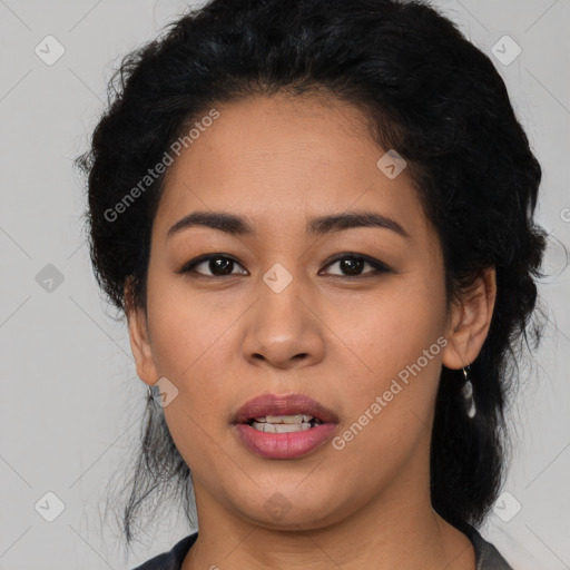 Joyful latino young-adult female with medium  black hair and brown eyes