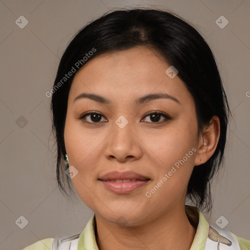 Joyful asian young-adult female with medium  black hair and brown eyes