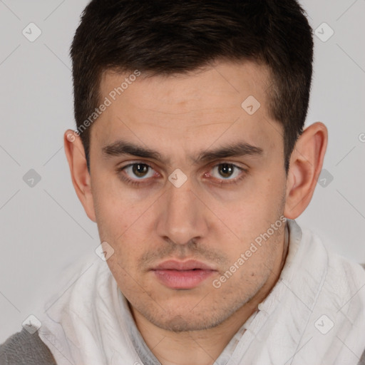 Neutral white young-adult male with short  brown hair and brown eyes