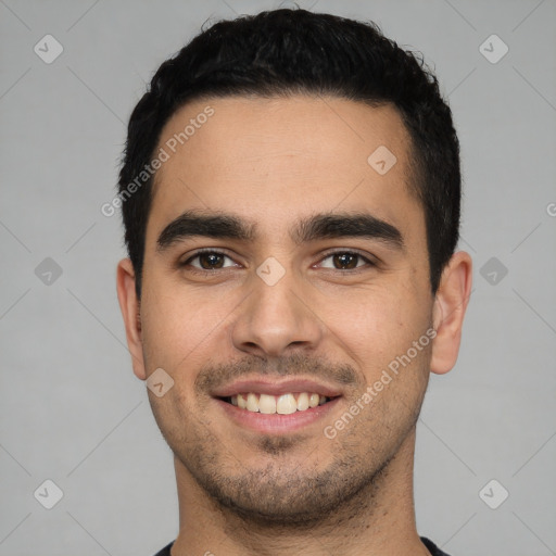 Joyful white young-adult male with short  black hair and brown eyes