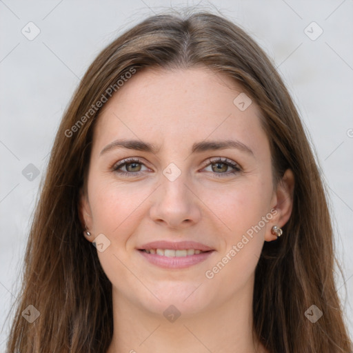 Joyful white young-adult female with long  brown hair and grey eyes