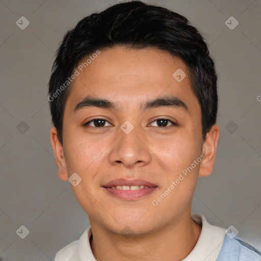 Joyful asian young-adult male with short  black hair and brown eyes