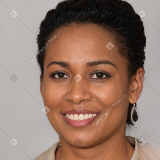 Joyful latino young-adult female with short  brown hair and brown eyes