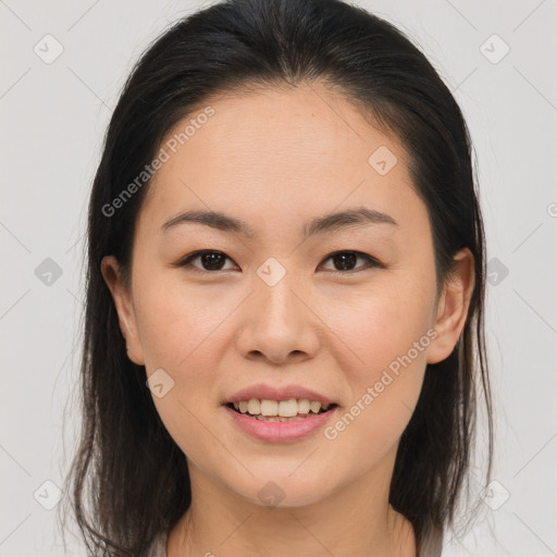 Joyful asian young-adult female with medium  brown hair and brown eyes