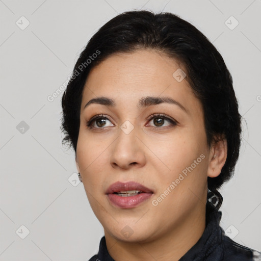 Joyful latino young-adult female with medium  black hair and brown eyes