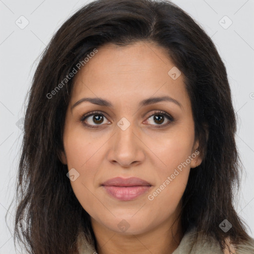 Joyful latino young-adult female with long  brown hair and brown eyes