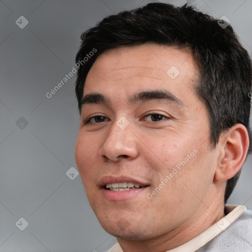 Joyful white young-adult male with short  black hair and brown eyes