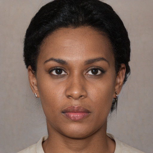 Neutral latino young-adult female with short  black hair and brown eyes