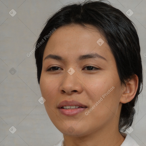 Joyful asian young-adult female with medium  brown hair and brown eyes