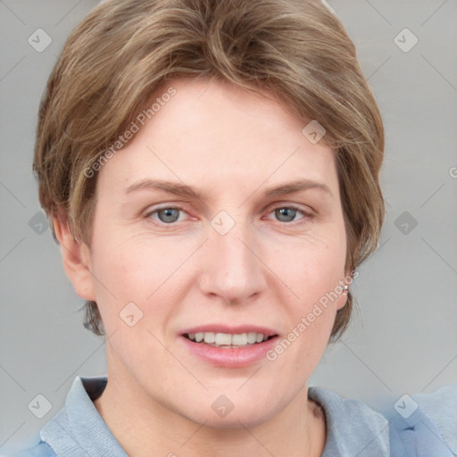 Joyful white adult female with medium  brown hair and blue eyes