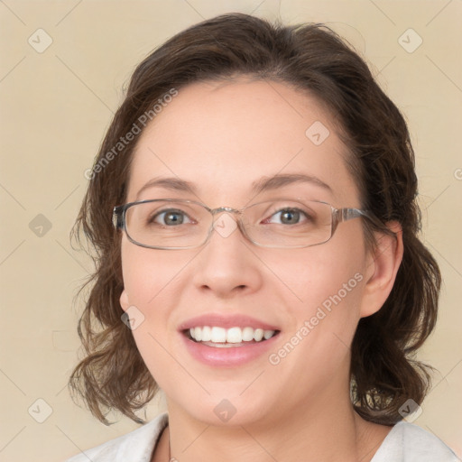 Joyful white young-adult female with medium  brown hair and green eyes