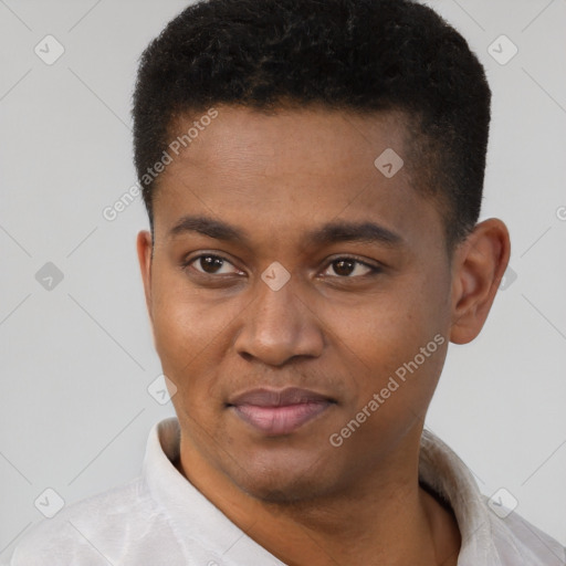 Joyful latino young-adult male with short  brown hair and brown eyes