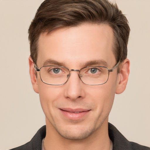 Joyful white adult male with short  brown hair and grey eyes