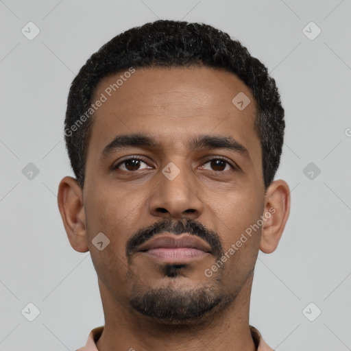 Neutral latino young-adult male with short  black hair and brown eyes