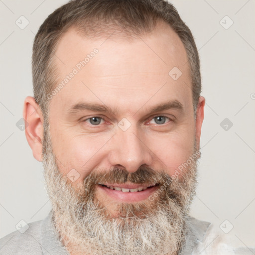 Joyful white adult male with short  brown hair and grey eyes