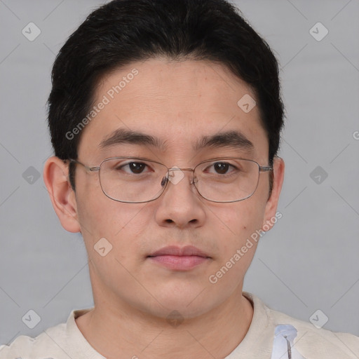 Neutral asian young-adult male with short  brown hair and brown eyes