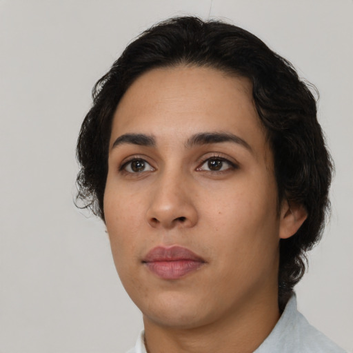 Neutral latino young-adult female with medium  black hair and brown eyes