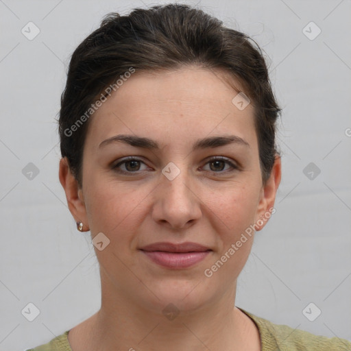 Joyful white young-adult female with short  brown hair and grey eyes