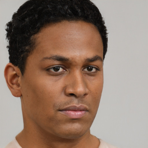 Neutral black young-adult male with short  brown hair and brown eyes