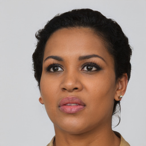 Neutral latino young-adult female with short  black hair and brown eyes
