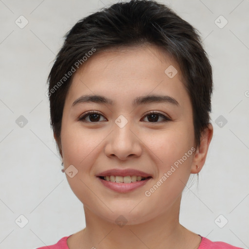 Joyful asian young-adult female with short  brown hair and brown eyes