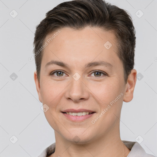 Joyful white young-adult female with short  brown hair and brown eyes