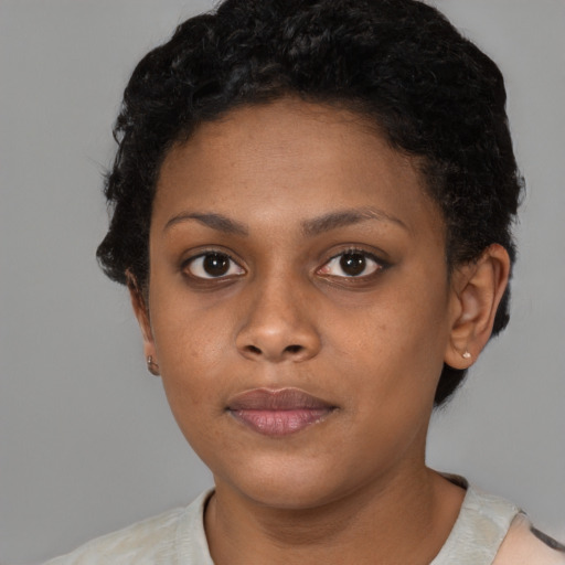 Neutral black young-adult female with short  black hair and brown eyes