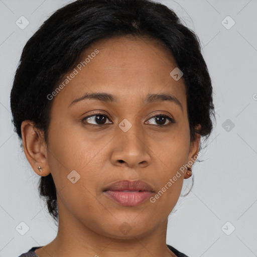 Joyful latino young-adult female with medium  brown hair and brown eyes