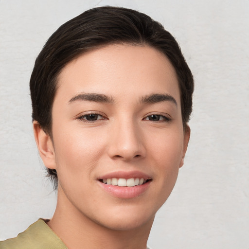 Joyful white young-adult female with short  brown hair and brown eyes